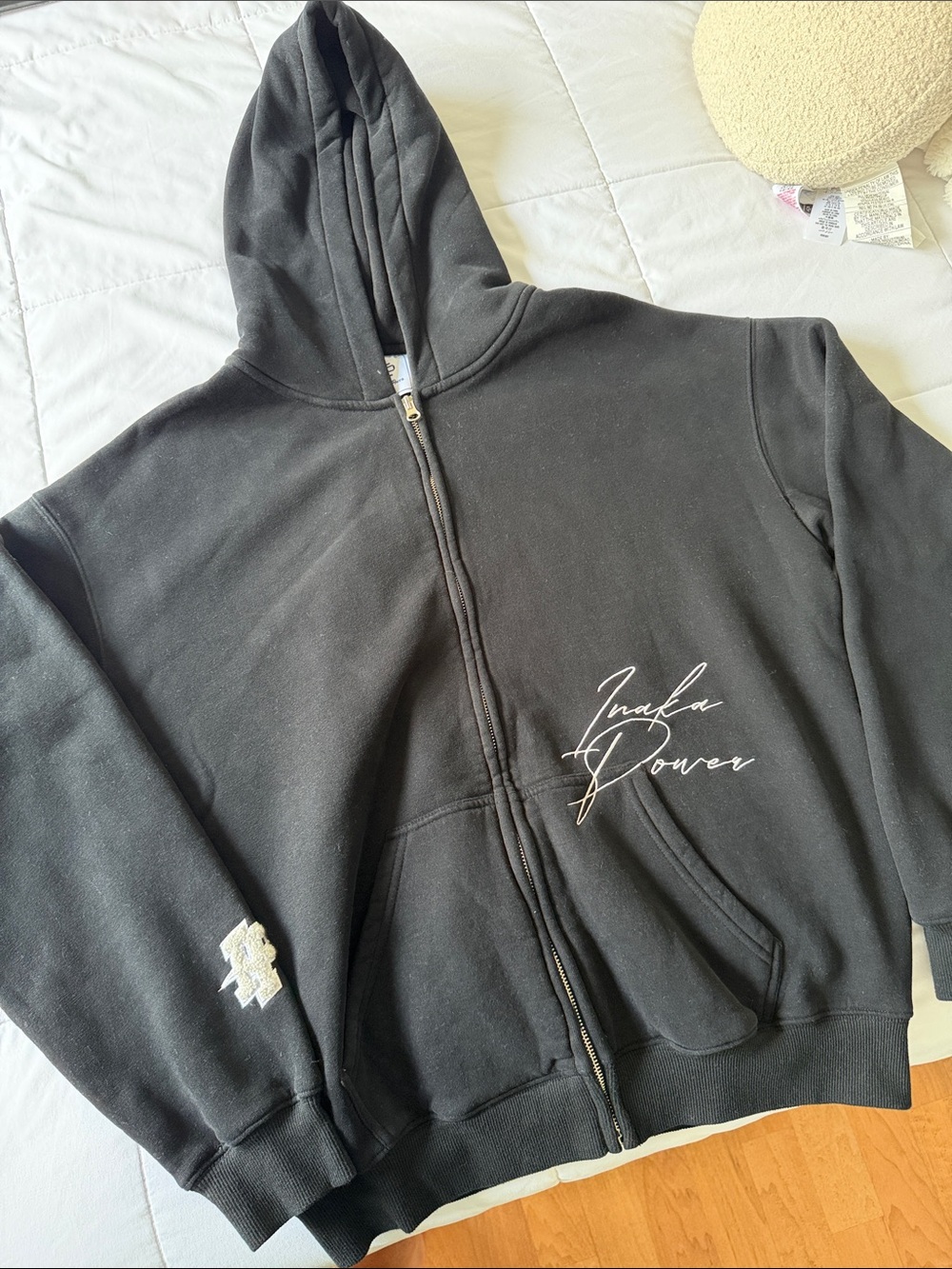 Inaka Power Black Zip-Up Hoodie with White Script Logo